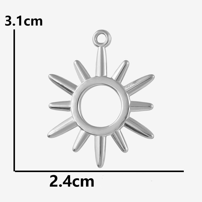 Silver sun charm