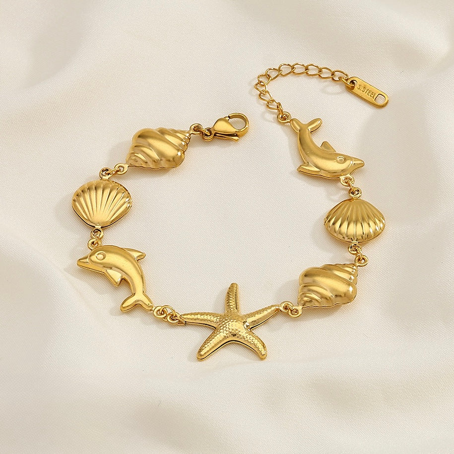 Gold ocean creatures linked bracelet