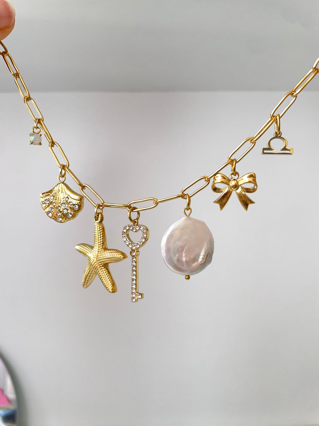 Sparkly shell charm