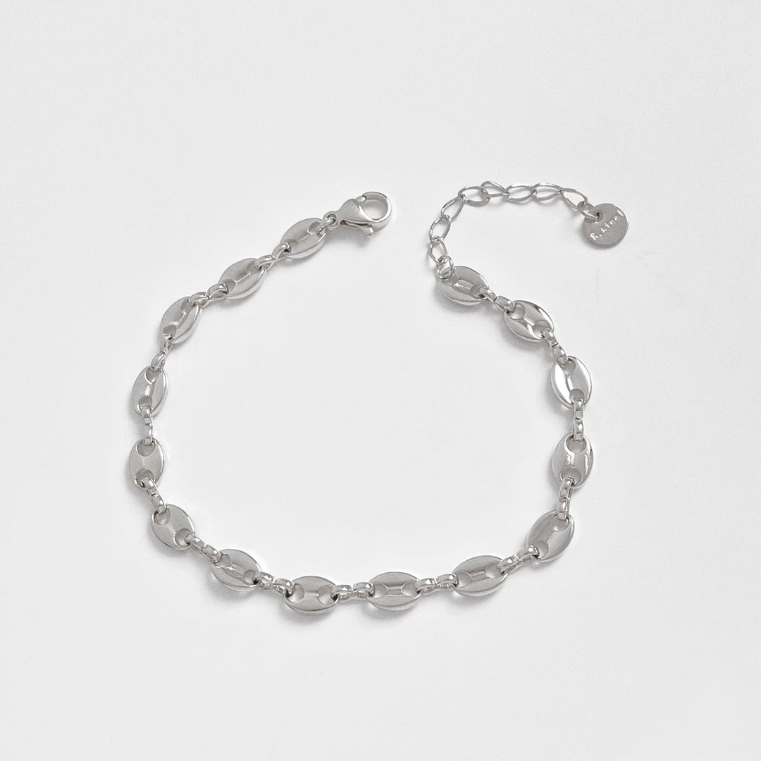Fiber linked silver bracelet