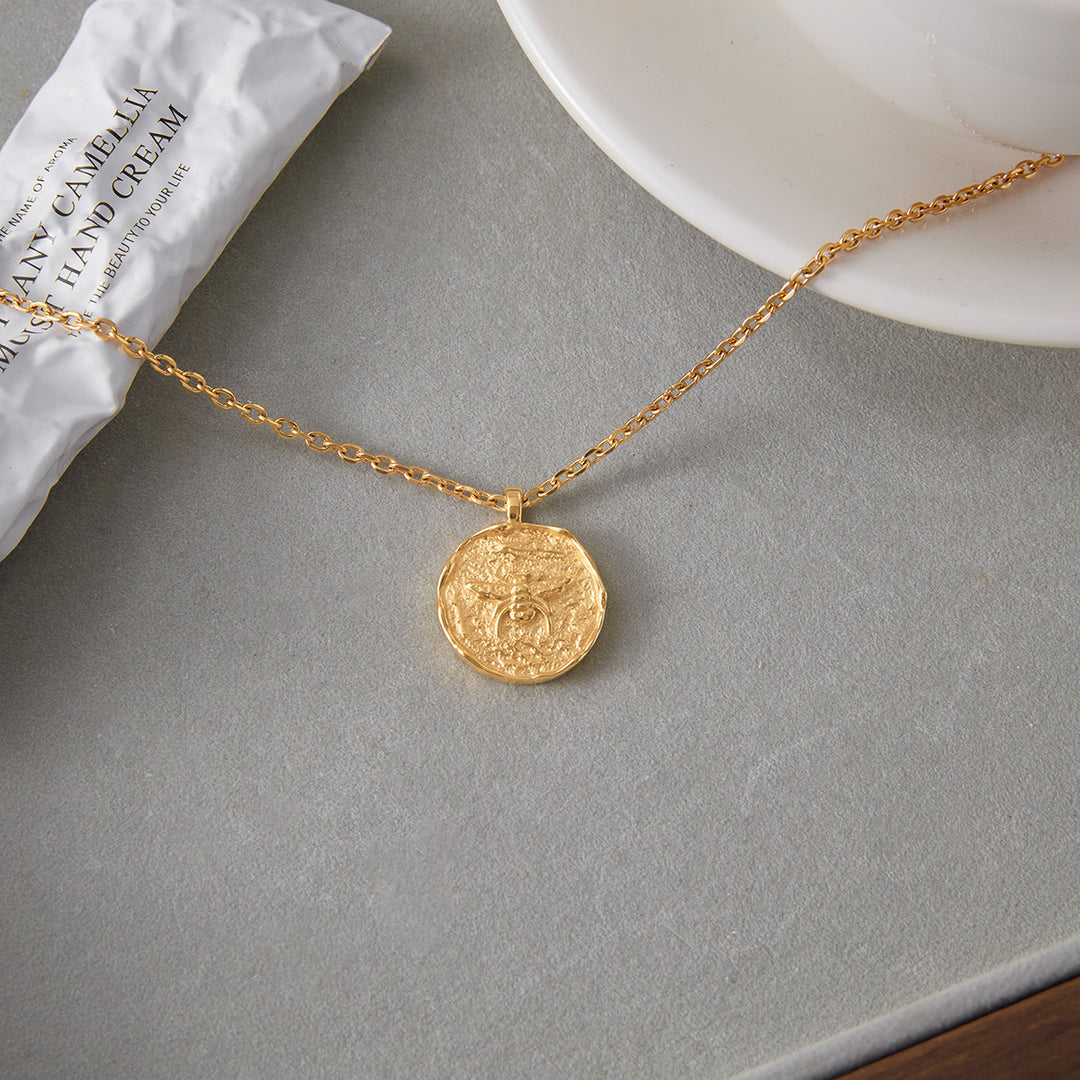 Bee coin necklace