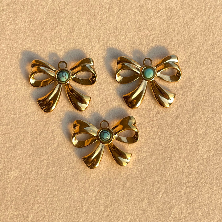 Turquoise bow charm