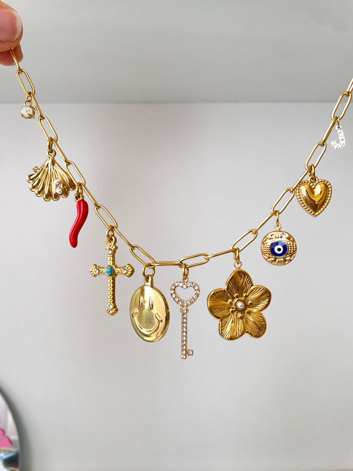 Pearl shell charm - arrives june 7