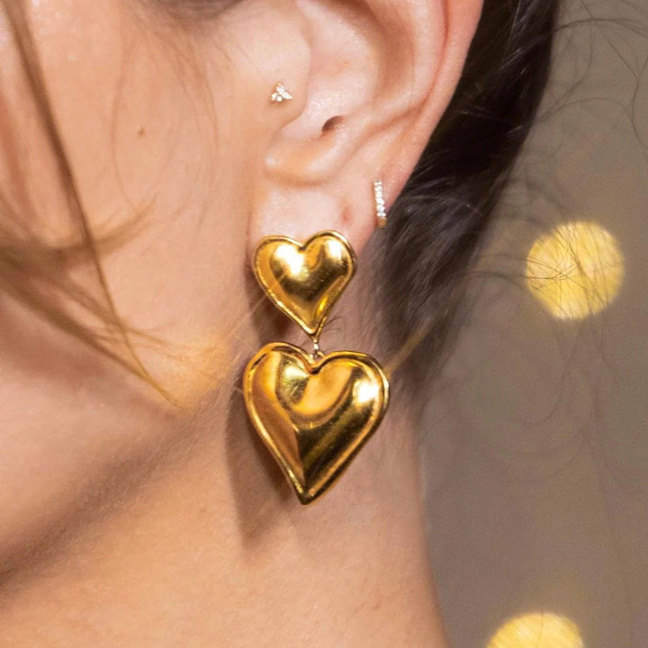Bold double heart earrings gold