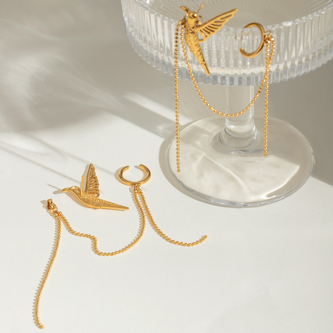 Bird statement earrings