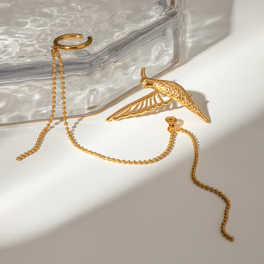 Bird statement earrings