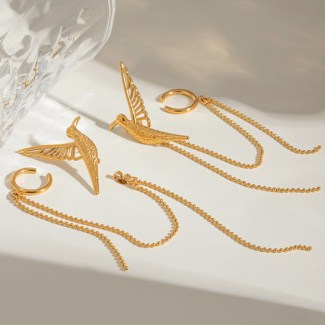 Bird statement earrings