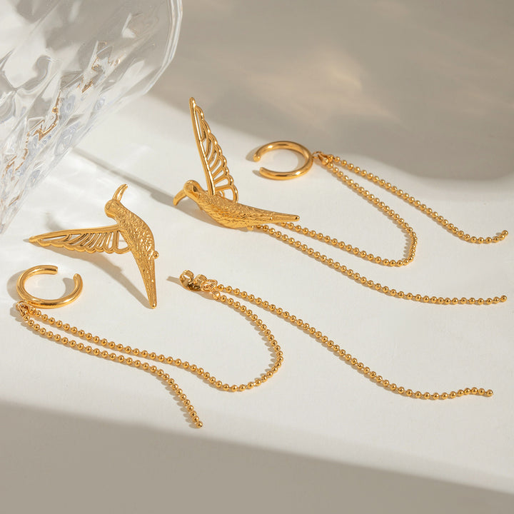 Bird statement earrings