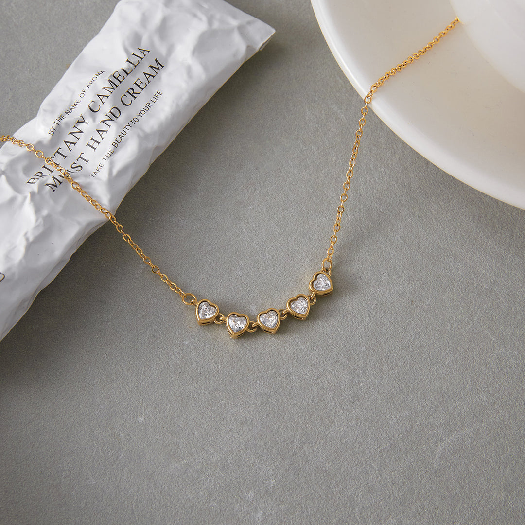 Bubble linked hearts necklace